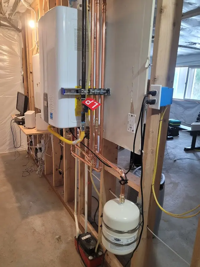 Licensed plumber repairing a kitchen sink in Lawrenceburg